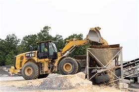 Rahns Concrete: A Caterpillar 966M loads sand into a hopper at a Ready-Mix plant.